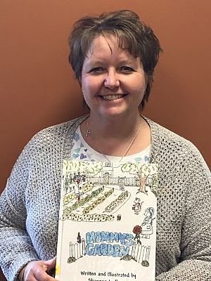 picture of miss shannon and her book