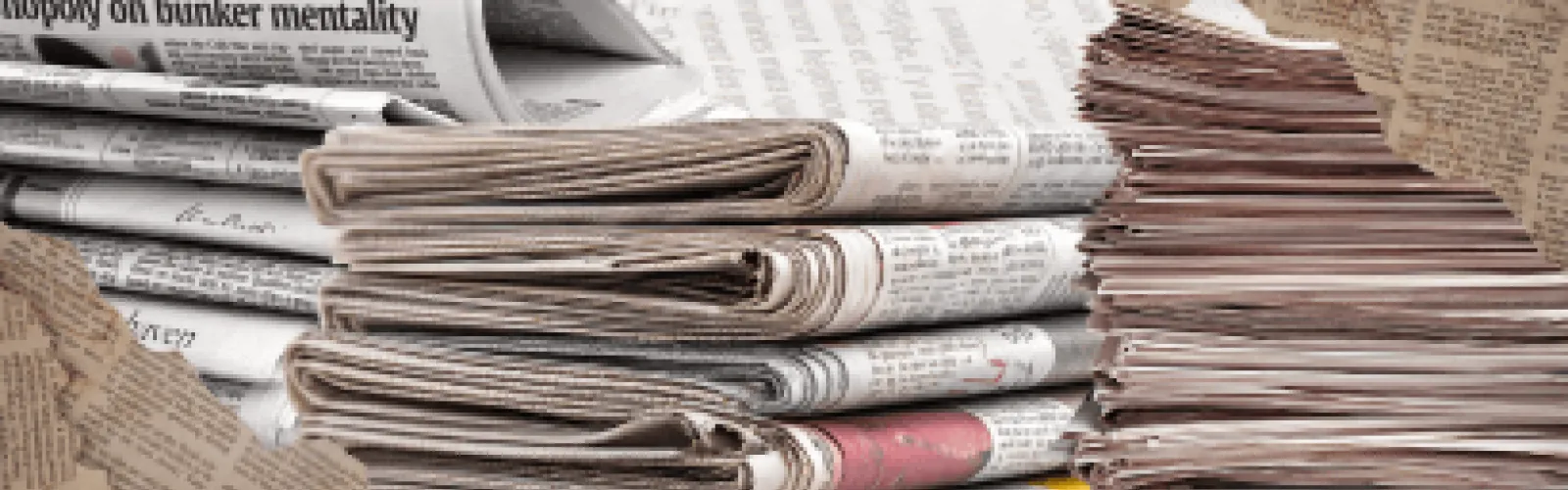 Stacks of newspapers. 