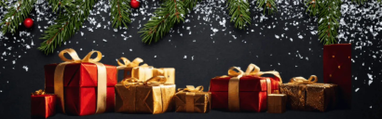 Christmas presents and pine garland with snow. 