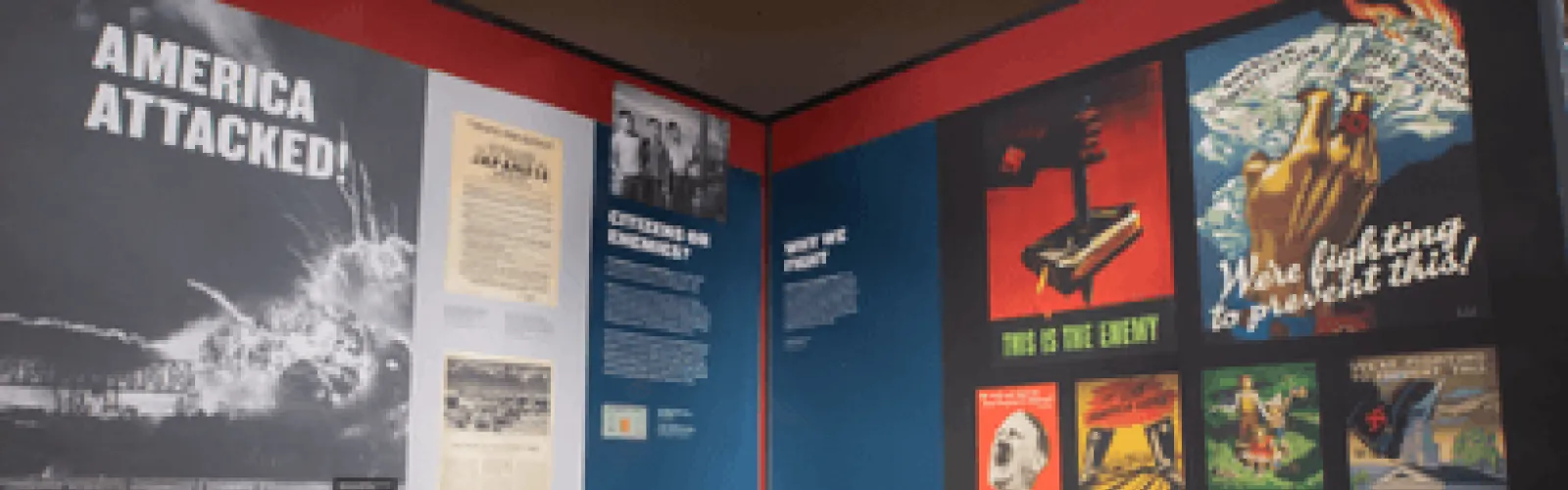 Panels of news articles and propaganda from World War II. 