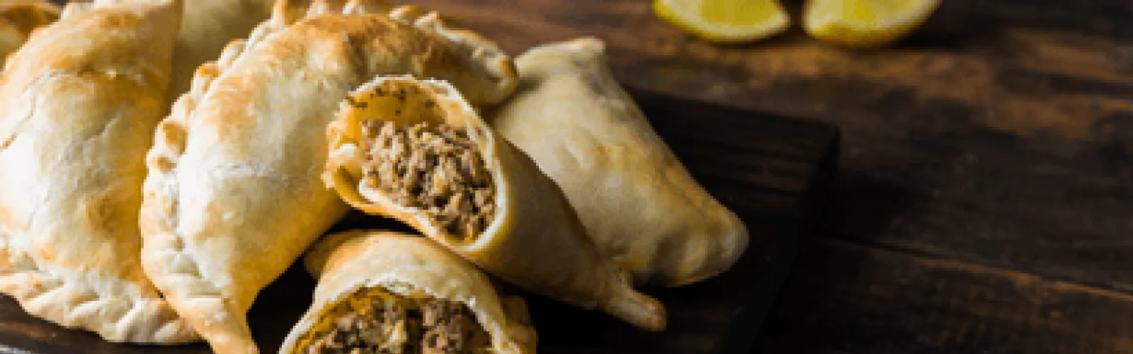 Empanadas on a table. 